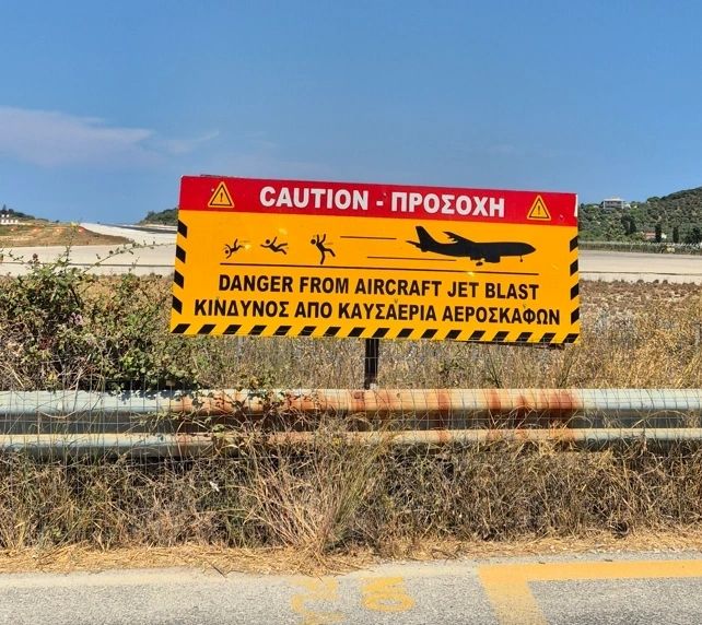 Caution sign at the end of the runway